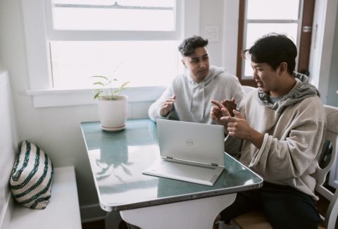 2 Men are sitting and talking