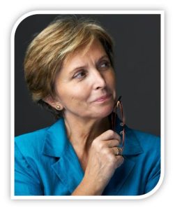 A woman is sitting and pondering a thought