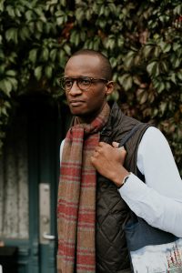 An African American man is walking