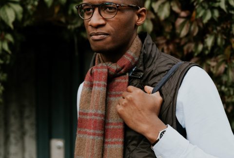 An African American man is walking