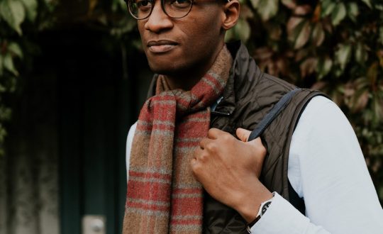 An African American man is walking